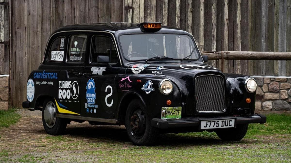 Meet the duo visiting all 16 World Cup venues in a London cab